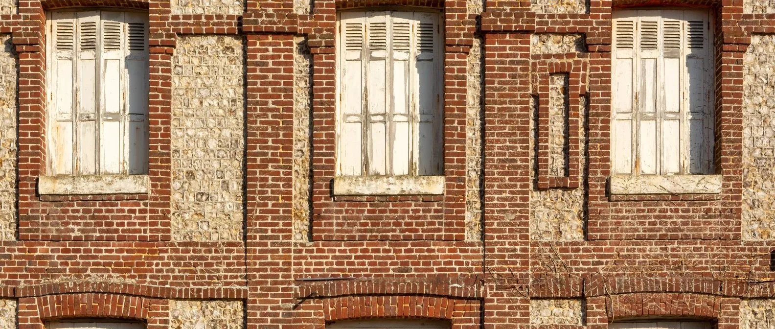 Bâtiment ancien dont le câblage d'appel malade décide du budget d'une rénovation